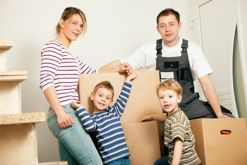 Furniture collection team handling bulky household items in Belsize Park