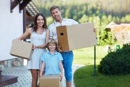 Removal van and moving team preparing a residential move in Belsize Park