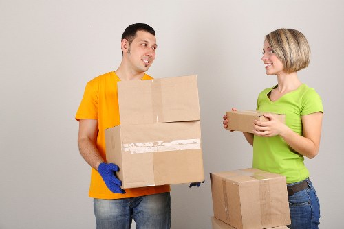 Removal team handling furniture loading with care